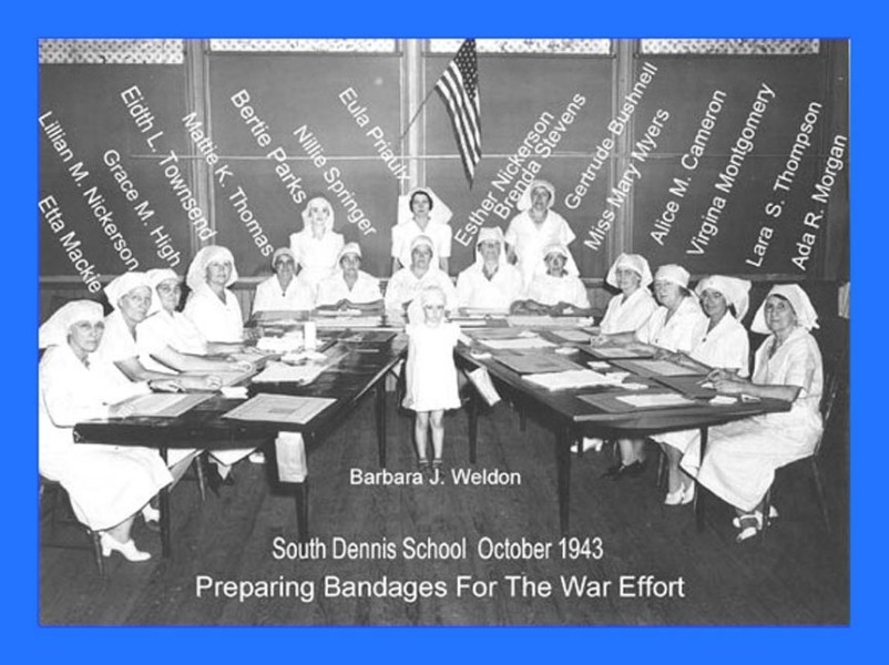 Woman volunteers preparing bandages for World War 2