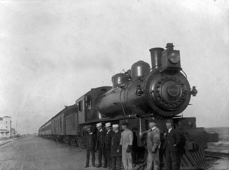 Vintage photo of Engine 6068 with crew standing in front